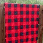 finished buffalo check quilt on fence