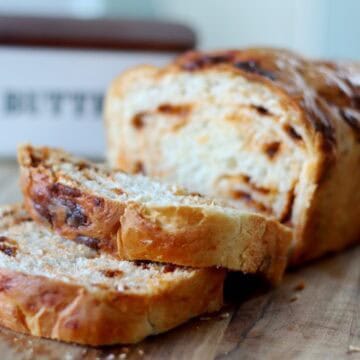loaf of cinnamon chip bread sliced