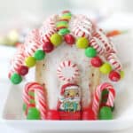 Pop tart gingerbread house decorated with candy and mints.