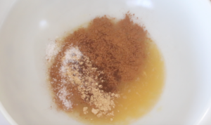 egg and sugar mixed with gingerbread spices in mixing bowl