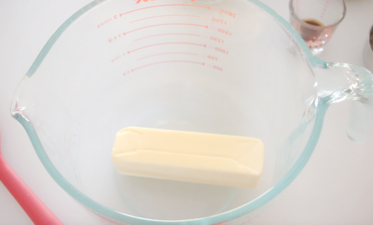 stick of butter in large glass bowl