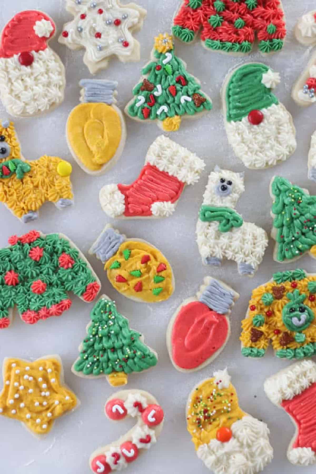 Variety of Christmas sugar cookies with buttercream frosting.