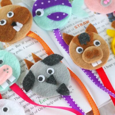animal bookmarks lined up on book