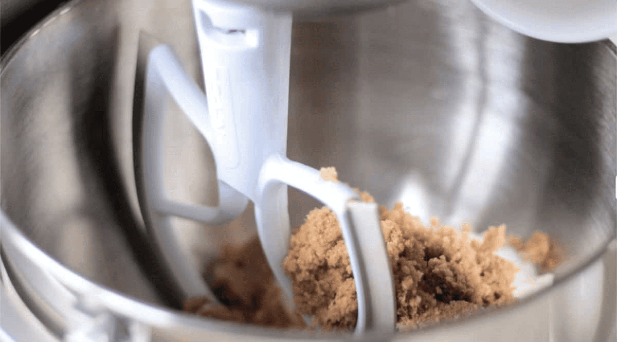 Butter, shortening and brown sugar mixed in stand mixer bowl.