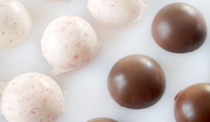 molded chocolate spheres on cutting board