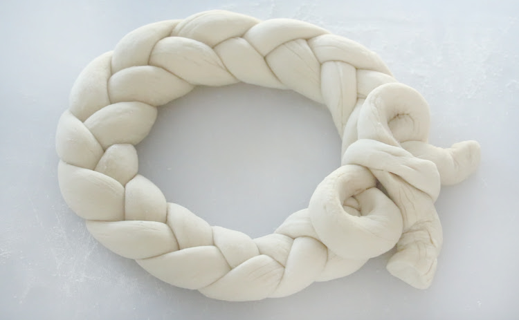 braided pretzel wreath on cutting board