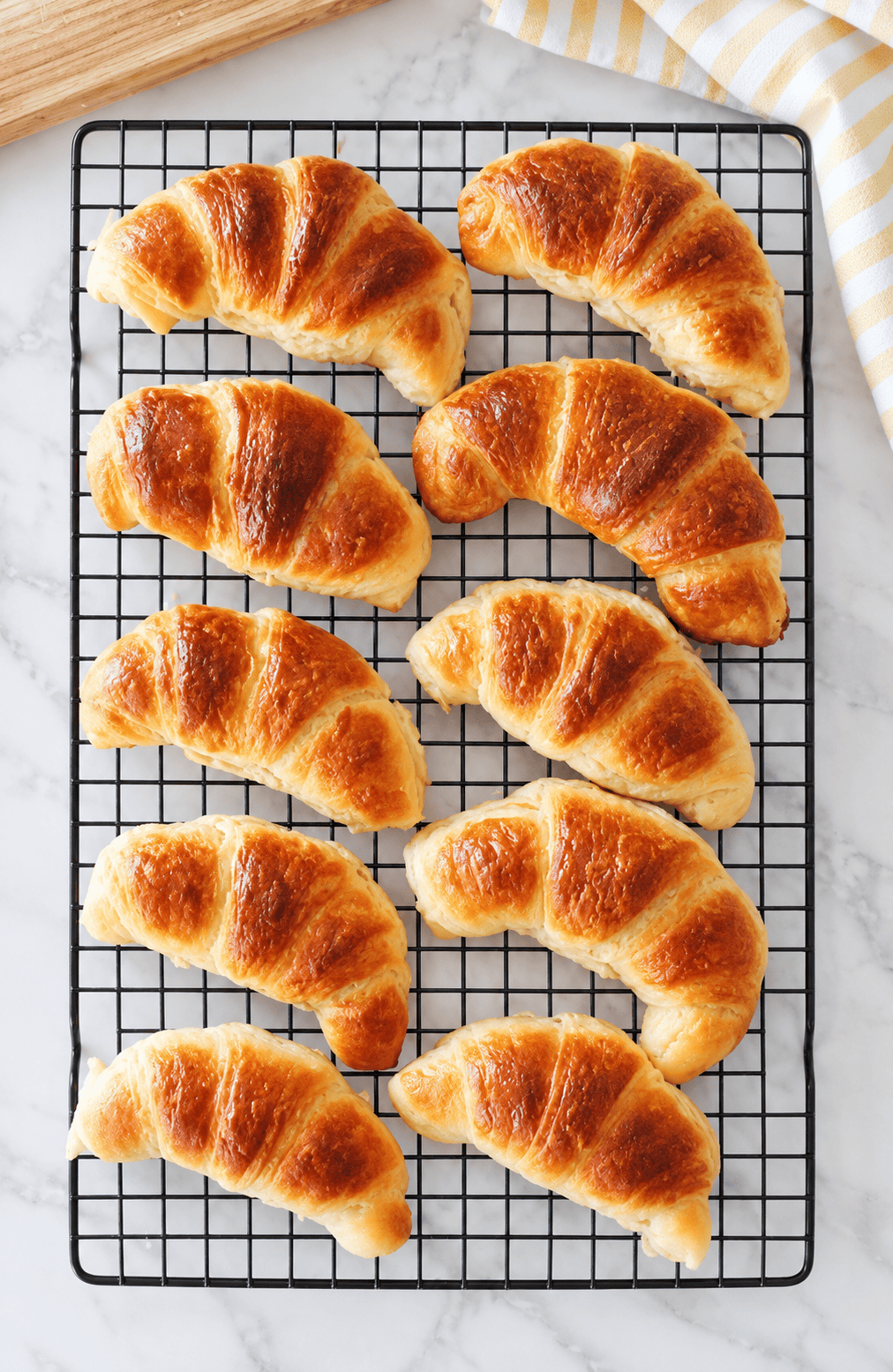 Croissants on cooling rack.