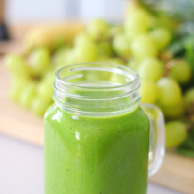 glass jar with green smoothie
