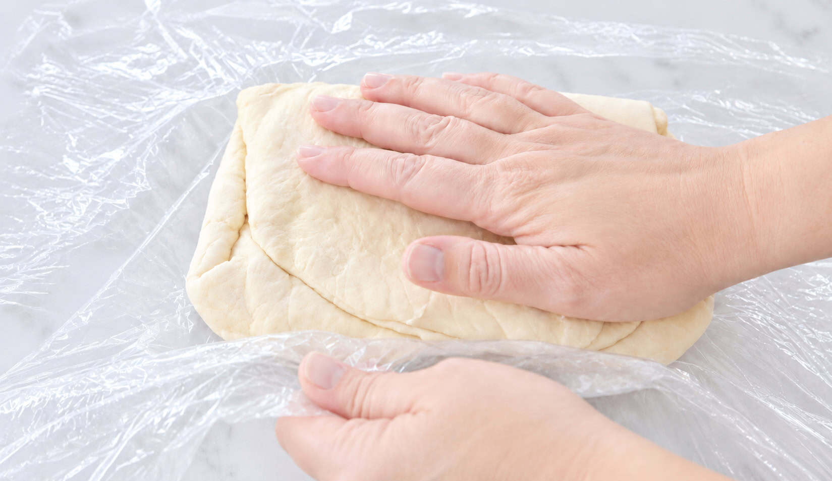 Croissant dough rolled and folded.