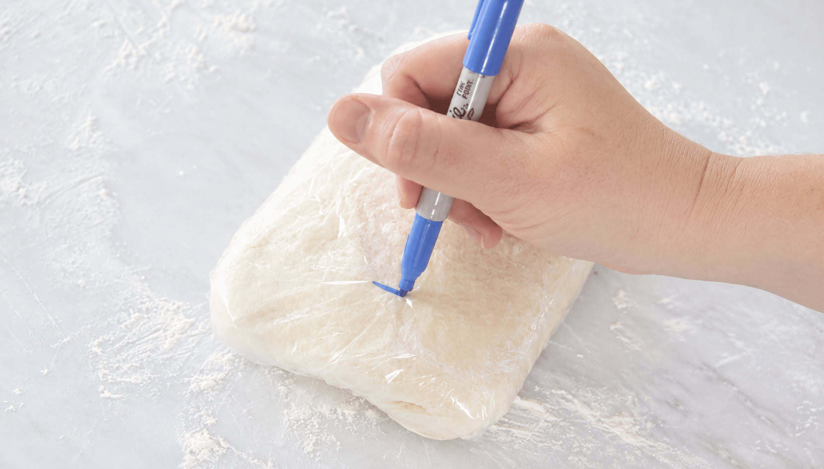 Dough wrapped in plastic with a number 1 on it.