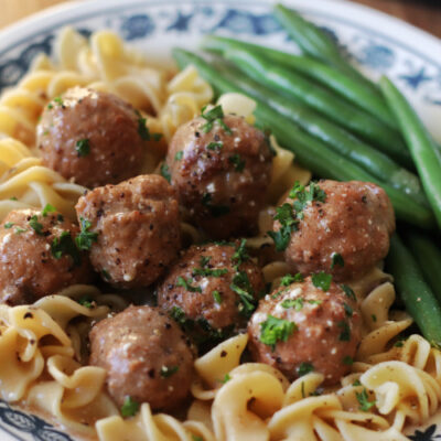meatballs and egg noddles on plate