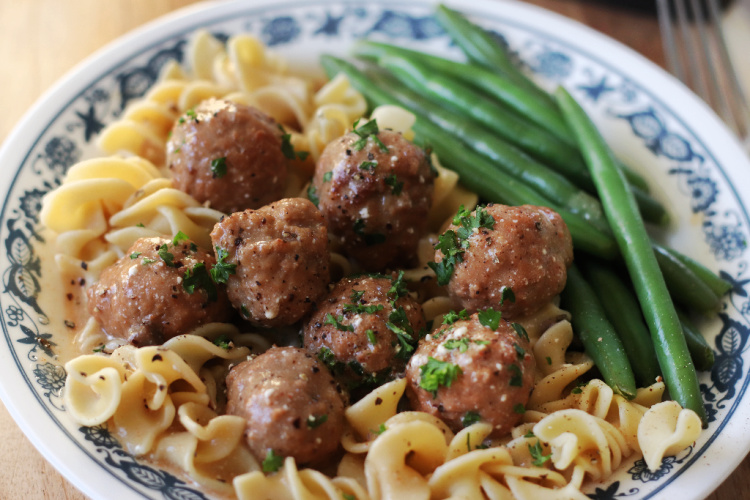 meatballs and egg noddles on plate