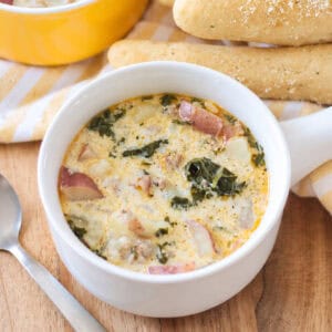Bowl of soup and breadsticks.