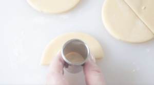 semi circle cookie dough cut with biscuit cutter