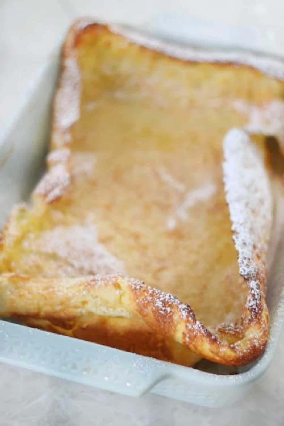 German pancakes in blue baking dish