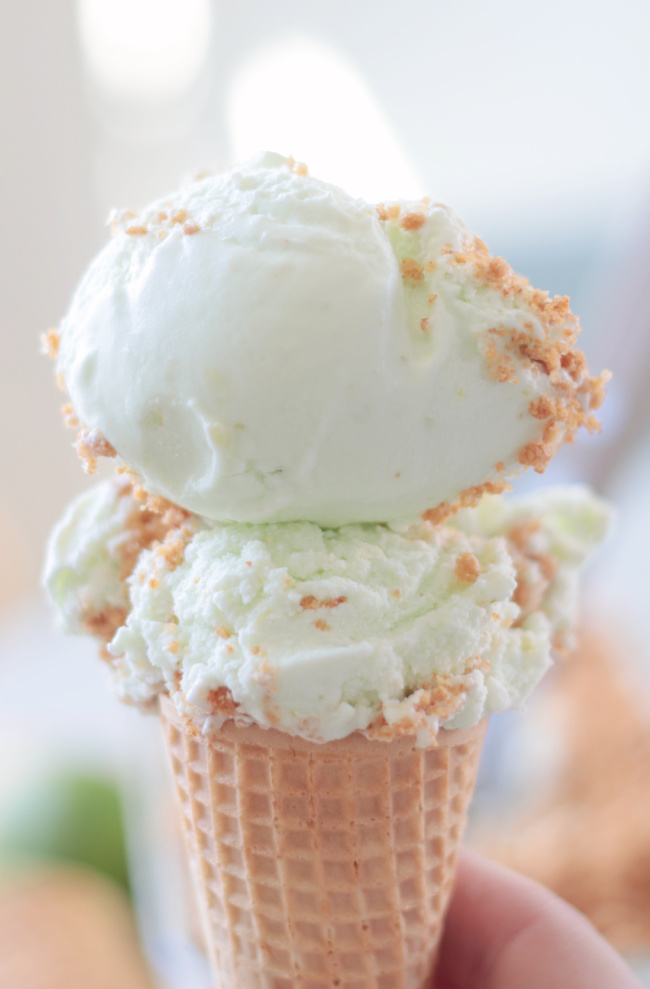 two scoops of lime ice cream in a sugar cone