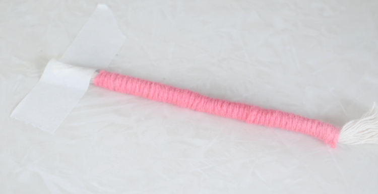 rope wrapped in pink yarn