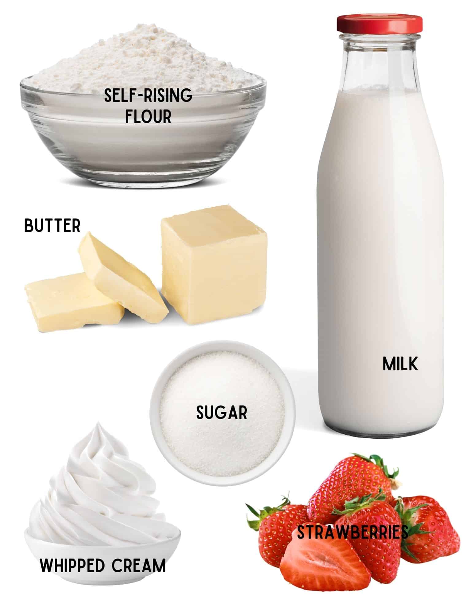Bowl of flour, sugar, whipped cream, bottle of milk, stick of butter and pile of fresh strawberries.