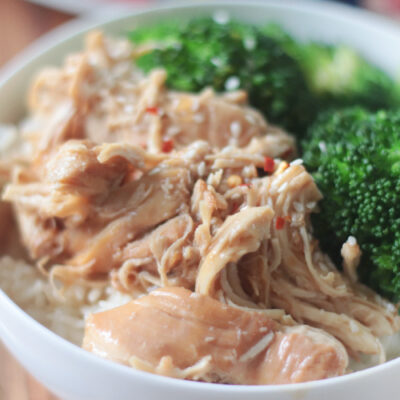 bowl of slow cooker chicken teriyaki with rice and broccoli