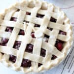 Cherry pie on prep mat.