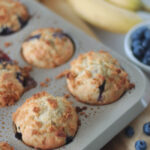 blueberry banana muffins in muffin pan