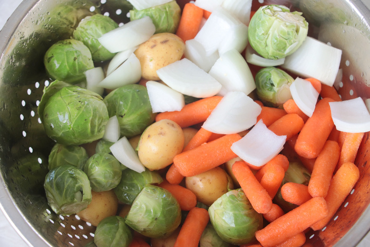 washed and chopped vegetables in a colander