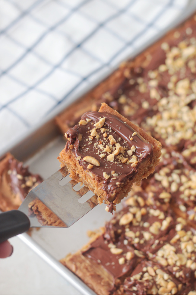 chocolate peanut butter cookie bars cut into squares