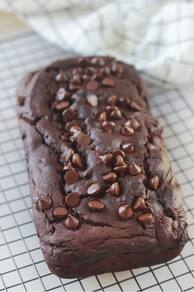 loaf of double chocolate pumpkin bread on cooling rack