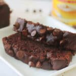 Two slices of chocolate pumpkin bread on a plate.