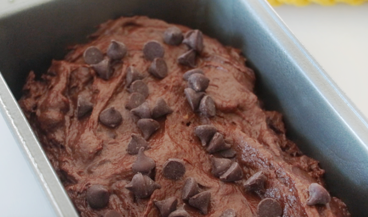 unbaked bread in pan topped with chocolate chips