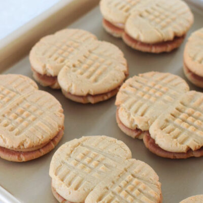 peanut butter sandwich cookies on baking sheet