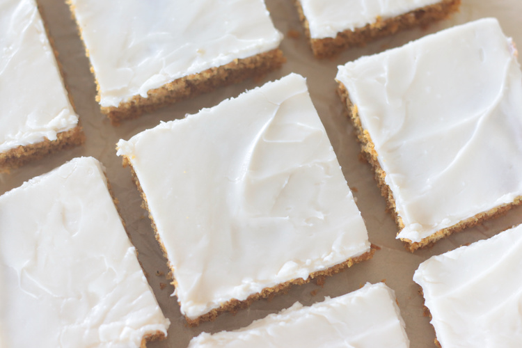 cut pumpkin bars with cream cheese frosting