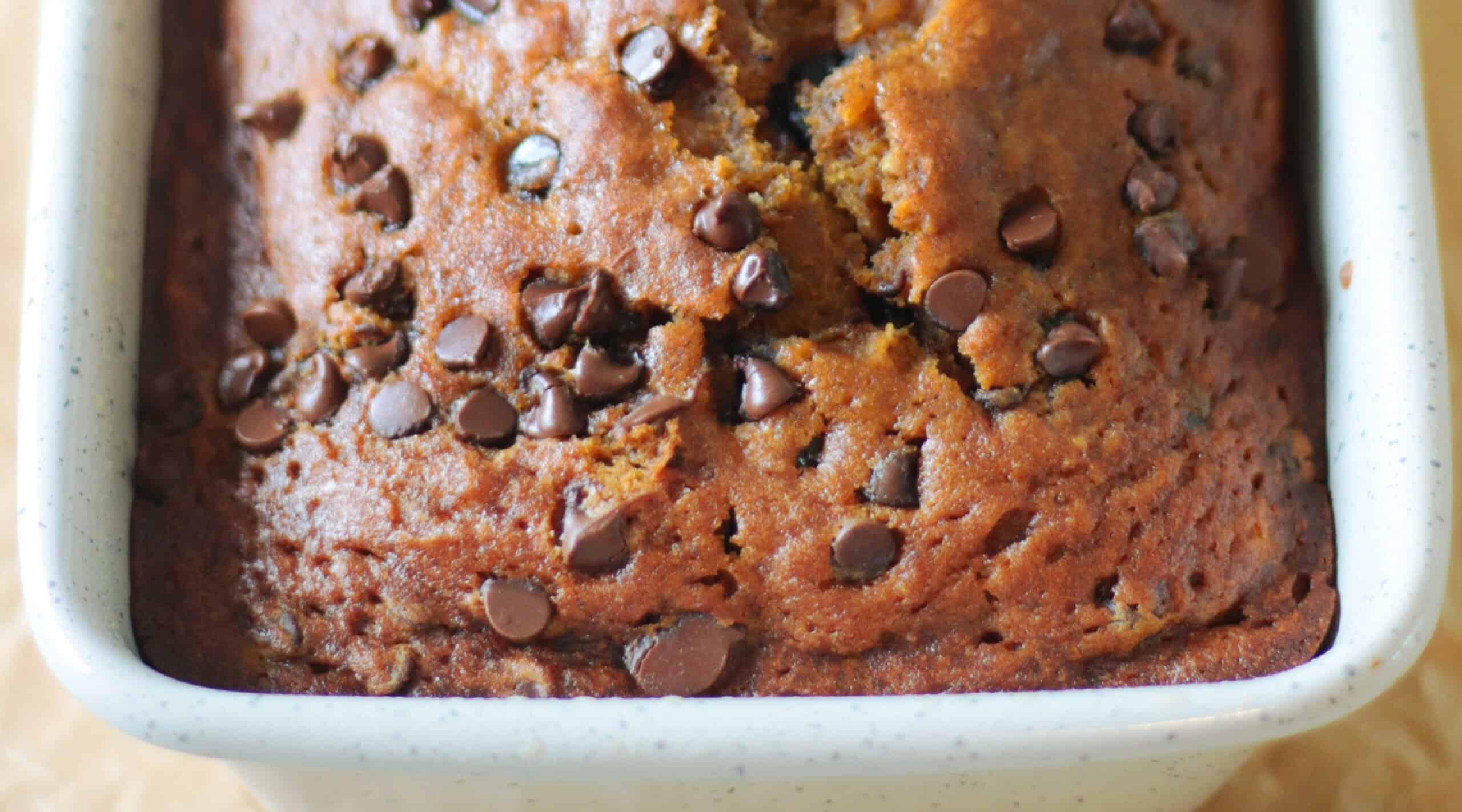 Loaf of pumpkin bread in pan.