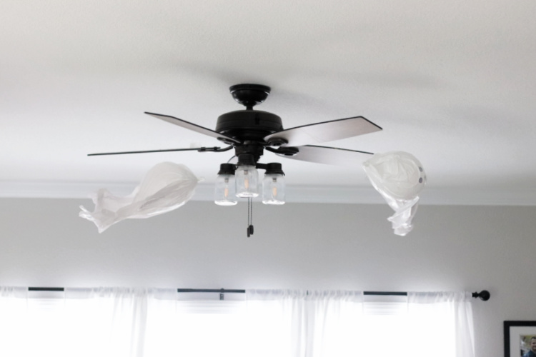 two ceiling fan balloon ghosts on fan