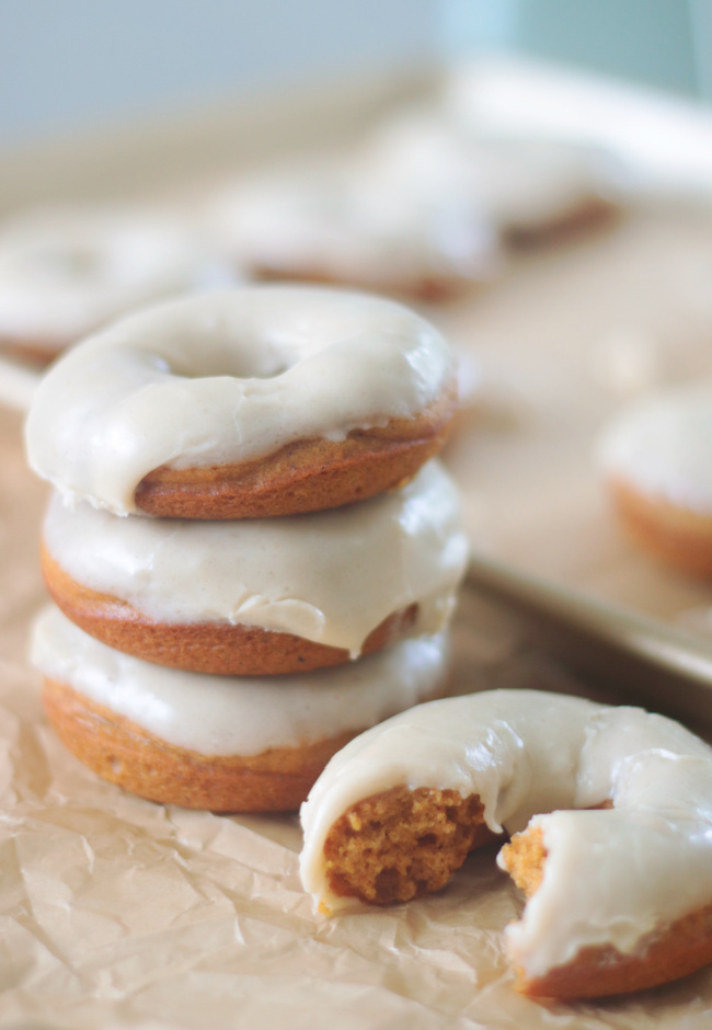 stack of glazed pumpkin donuts