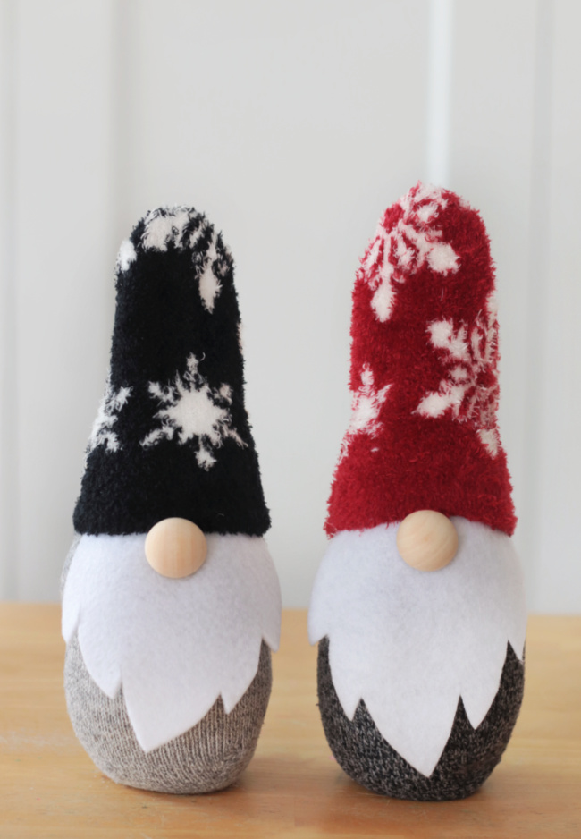 two sock gnomes on a table