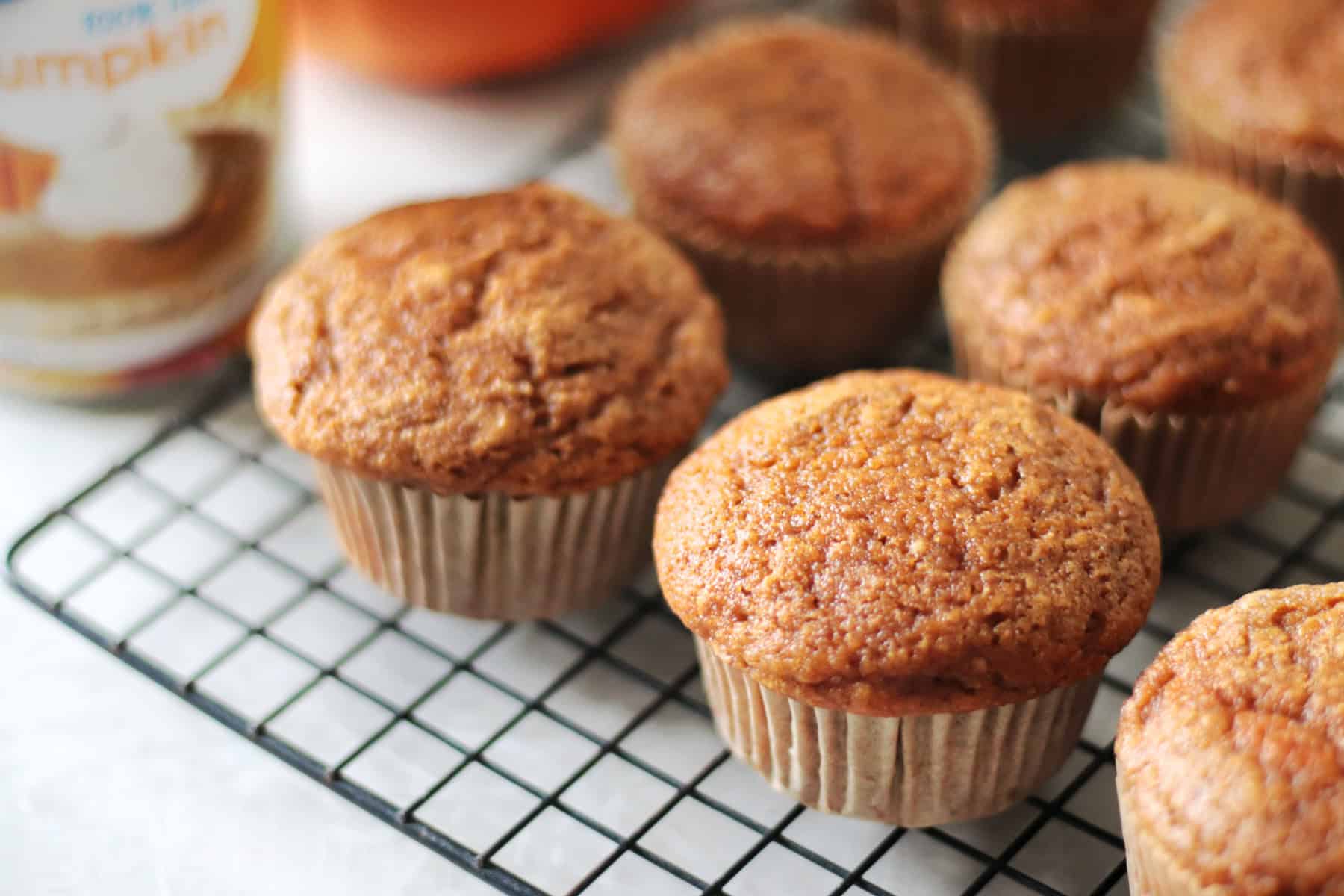 Pumpkin muffins on cooling rack.