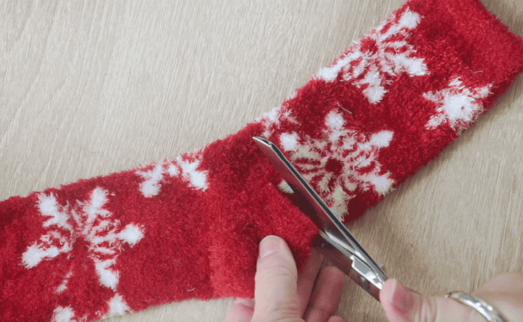 Red fuzzy sock cut in half.