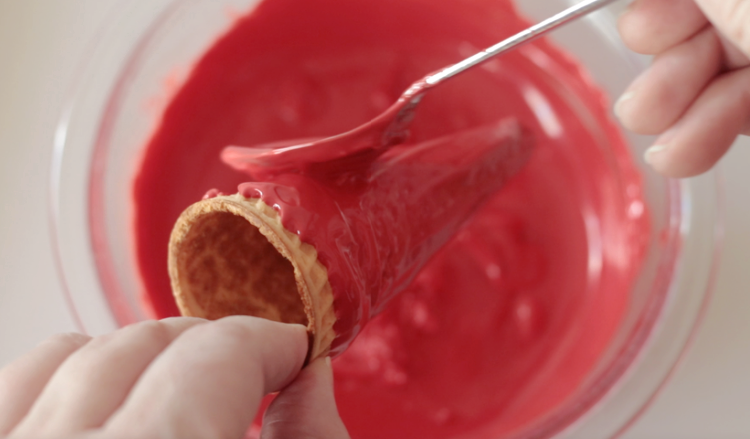 sugar cone spread with melted red candy melts
