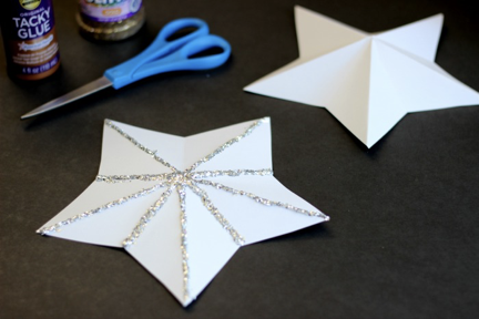 3D star with silver glitter on creases