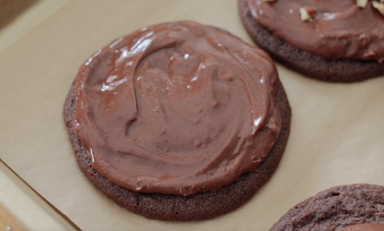 chocolate cookie covered in melted frosting