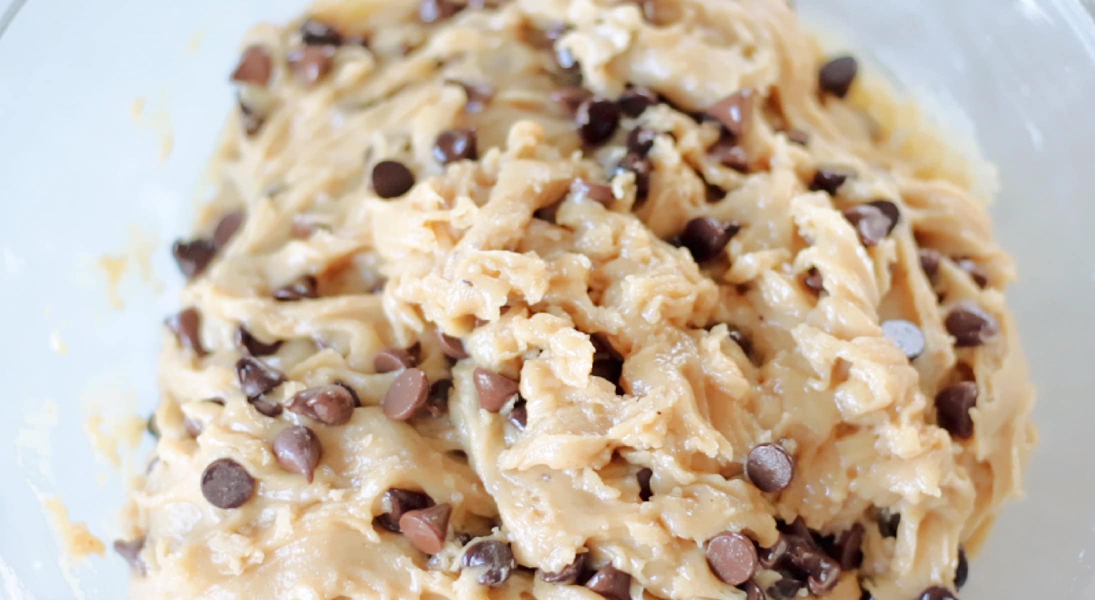 Brown butter chocolate chip cookie dough in mixing bowl.