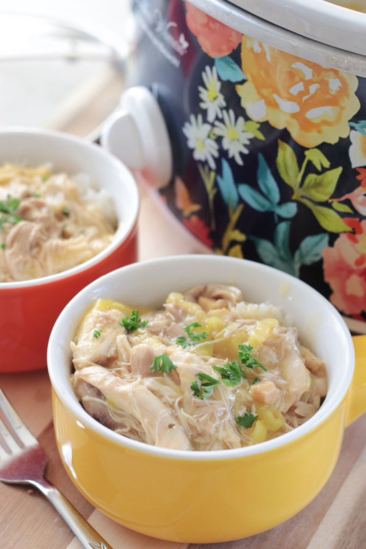 bowls of slow cooker pepperoncini chicken and white rice