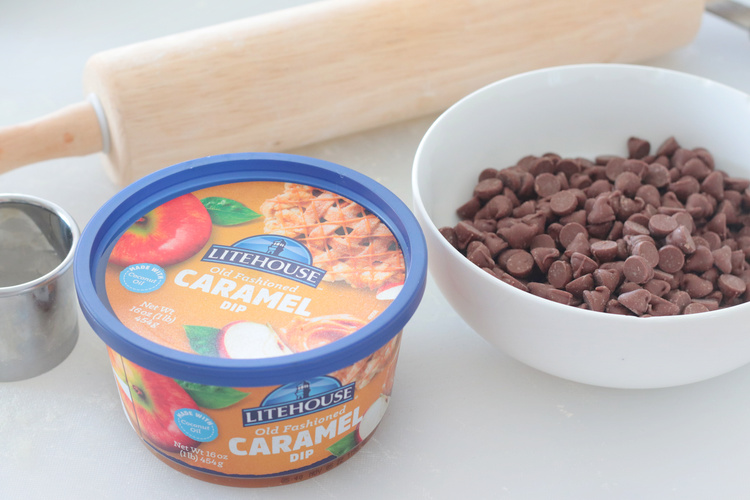 container of caramel and bowl of chocolate chips