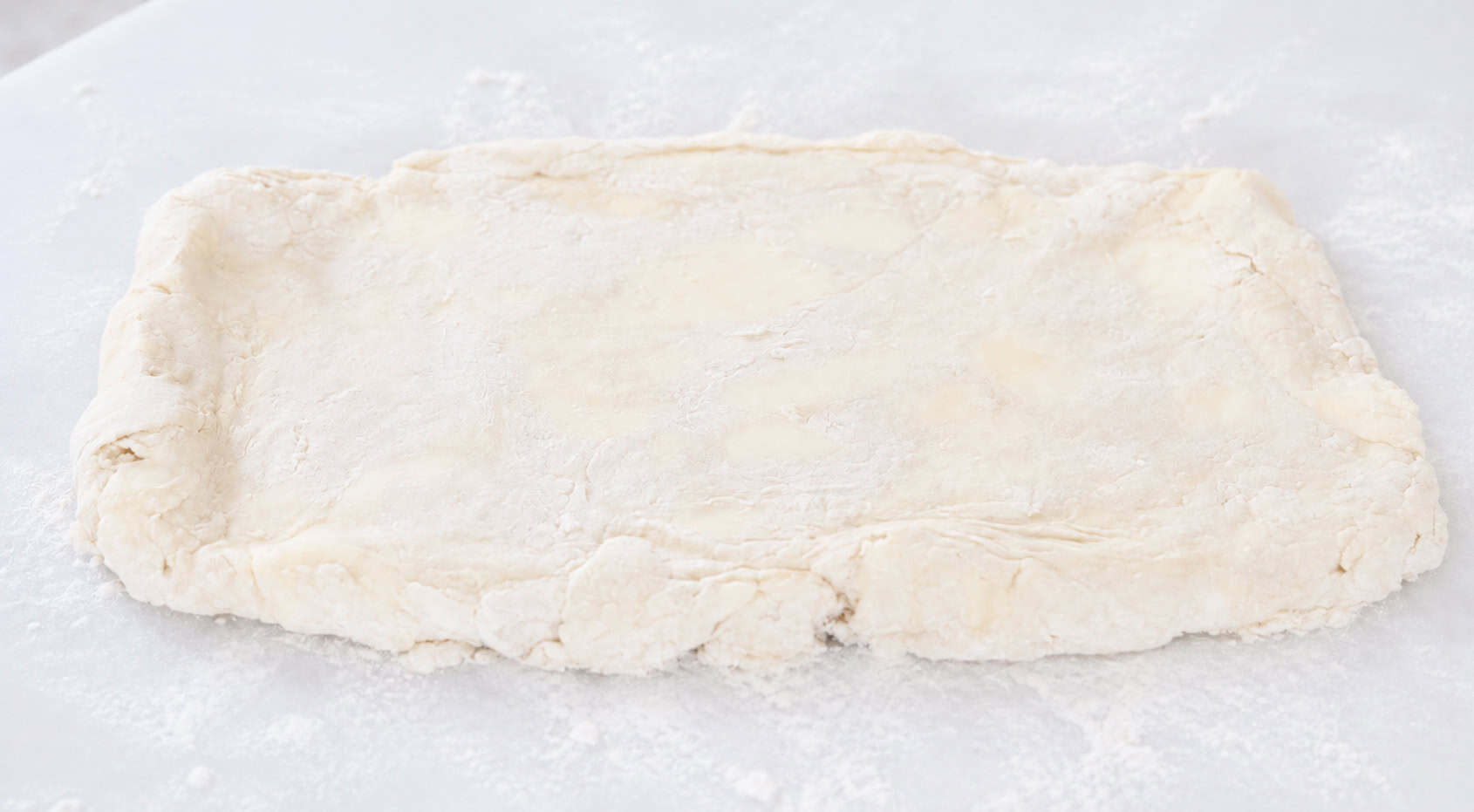Puff pastry dough rolled out.