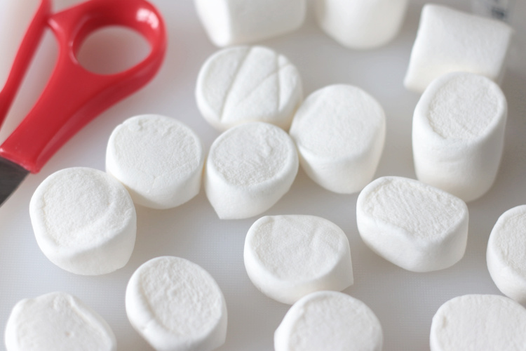 marshmallows on cutting board