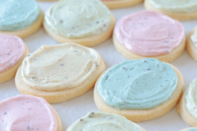 sugar cookies with pastel speckled frosting