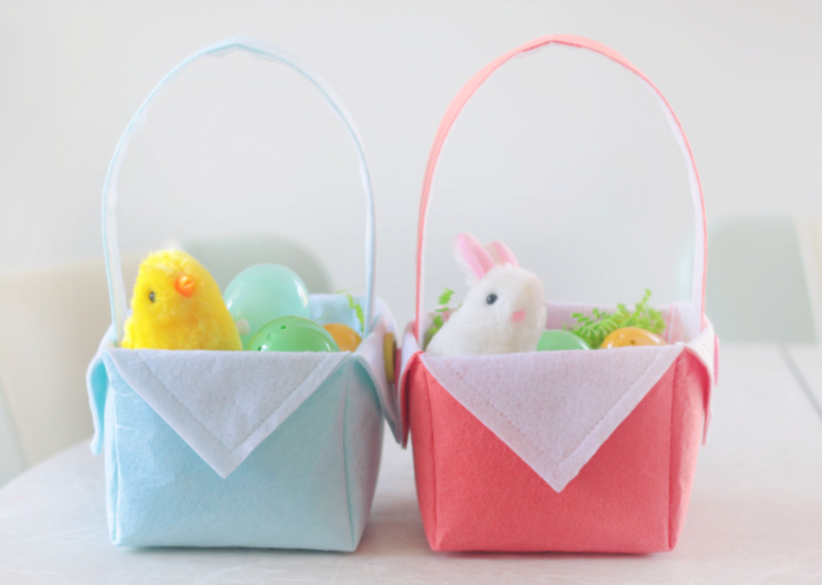 two small easter baskets side by side on table