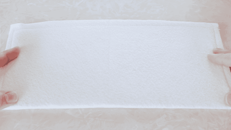 Easter basket fabric folded in half.