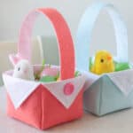 Two felt Easter baskets filled with eggs and toys.
